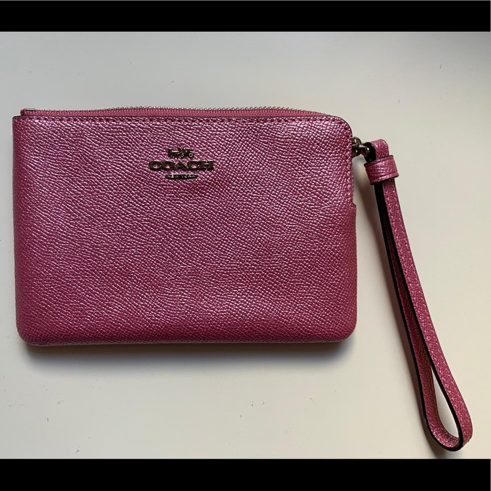 Coach corner zip wristlet- metallic pink